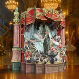 Decorative Christmas Pop Up Card scene with fairy and Nutcracker figures in a festive setting.
