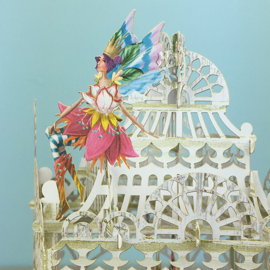 Flower Fairies play amongst flowers in laser cut paper birdcage by Me&McQ